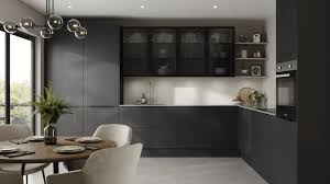 In the kitchen of an upper west side apartment, the sink, fittings, and tile backsplash are by waterworks. Black Kitchen Ideas Black Kitchen Designs Howdens
