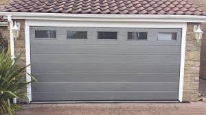Hormann M Ribbed Sectional Garage Door By Abi Hormann M Ribbed Insulated Sectional Garage Door Finished In Ral 9007 Grey Aluminium Wood Porte Garage Coloration