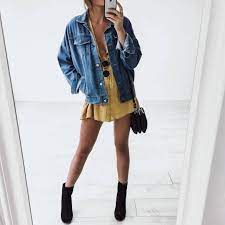 Denim Jacket Over Cute Yellow Dress With Black Boots And Handbag Fashion Jacket Outfits Summer Fashion
