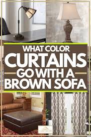 The living room s quatrine sofa sports a family friendly blue slipcover and complementary blue and white throw pillows. What Color Curtains Go With A Brown Sofa Home Decor Bliss