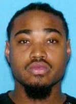 Police search for man charged in Ann Arbor bank robbery