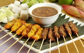 Satay These Tasty Meat Skewers Cook Up Over Coals So Hot They Need Fans To Waft The Smoke Away Whether It S Chic Food Dog Food Recipes Indian Food Recipes