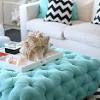 Its an ottoman, a coffee table, and a storage space, all in one. 3