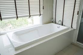 Don't start the first row of tile by resting it against the tub or shower. Bathtub Liner Remodel Your Tub Quickly And Easily