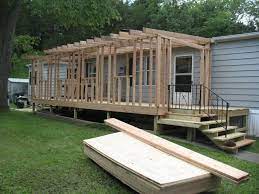 First build out the frame with pressure treated lumber. Mobile Home Sunroom During Mobile Home Addition Mobile Home Porch Home Porch
