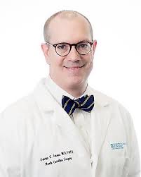 GEORGE ISAACS, MD, FACS