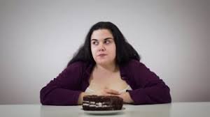 Fat attractive woman lying on gym floor with a massive cake. Young Caucasian Plump Girl Smelling Chocolate Cake And Moving Sweets Aside Fat Brunette Woman Controlling Herself Obesity Overweight Problem Lifestyle Stock Video Footage Storyblocks