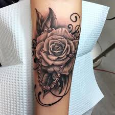 15 Designs With Precious Pearl Tattoos Pearl Tattoo Tattoos Rose Tattoos