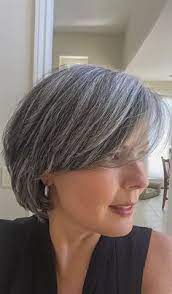Going gray is a process and it takes time. Haircut