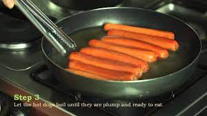 Bring the water to a boil, and add the hot dogs just as the wat. How To Boil A Hot Dog Youtube
