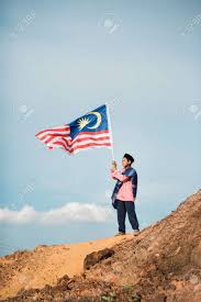 In fact, the american flag is considered to have been inspired by the. Photo Of A Boy Dressing In A Traditional Clothes Is Holding The Stock Photo Picture And Royalty Free Image Image 83496645