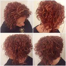 Short Curly Asymmetrical Bob Red Violet With Blonde Highlights Red Hair With Blonde Highlights Red Blonde Hair Red Curly Hair