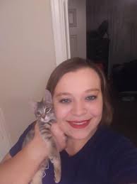 Karla Jacobs and first responder therapy dog Coco. The dog made many  friends this morning.