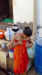 Desi bhabhi bathing outdoor - video 2 - ThisVid.com