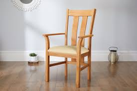 It is made from durable faux leather and features a beautiful stitched exterior. Churchill Solid Oak Cream Leather Carver Dining Chair