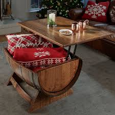 Wood wine barrel chandelier above a rectangular wooden dining table ad a set of white and beige dining chairs in a transitional dining room design. Reclaimed Wine Barrel Coffee Table With Unique Lift Top Wine Enthusiast Wine Barrel Coffee Table Barrel Coffee Table Barrel Coffee