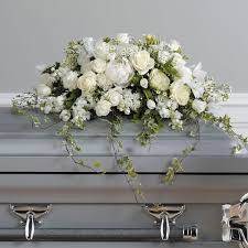 When you order funeral flowers from us, our skilled and compassionate los angeles florist works directly with the funeral homes to ensure from flowers for a funeral in los angeles to a smoothing sympathy plant, we can help brighten the day of the brokenhearted. Loving Memories Casket Spray Funeral Flower Arrangements Funeral Flowers Casket Flowers