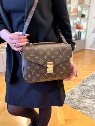 Though many think the louis vuitton pochette metis is only a couple years old, it was first released in 2013. Louis Vuitton Pochette Metis Monogram Canvas Luxury Bags