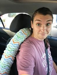 Tucking a large cooler backpack behind the seat for extra stability