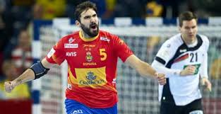 Su esquema iconográfico es bastante simple ya que muestra un águila real negra con el pico y las alas abiertos sobre un fondo amarillo. Espana Alemania El Europeo De Balonmano En Directo