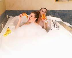 Bath bubbles make excellent jewellery, hats, beards, and even clothing for little people in the tub. Take A Bubble Bath With Your Partner Couple In The Kitchen