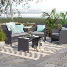 World Menagerie Tessio 4 Piece Rattan Sofa Seating Group With Cushions Reviews Conversation Set Patio Outdoor Sofa Sets Garden Patio Furniture