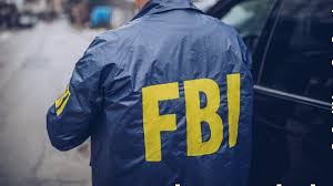 An fbi agent is consoled near the broward county office of medical examiner and trauma services in fort lauderdale, florida, on tuesday, february 2, 2021. Two Fbi Agents Killed Three Hurt In Shooting While Serving Warrant In Florida Officials Ksro