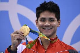 Swimmer Joseph Schooling returns to Singapore a hero after Rio Olympics