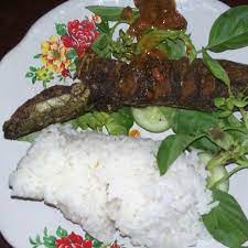 Pecel Lele Deep Fried Catfish With Vegetables And Hot Sambal And Steamed Rice