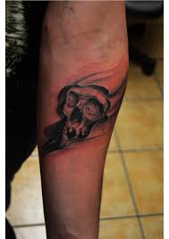 Symbolizing mortality, immortality and the dramatic interplay between life and death, skull tattoos embody the shadow side supremely beloved by tattoo enthusiasts worldwide. Small Skull Tattoos On Arm Arm Tattoo Sites