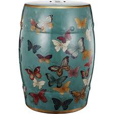 Stylist S Tip Pairing A Colorful Butterfly Motif And Subtly Textured Design This Stylish Stool Lends A Garde Ceramic Garden Stools Garden Stool Ceramic Stool