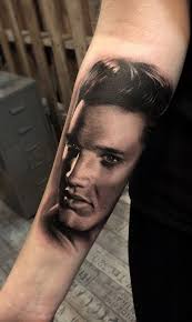 The left side of his kevin's chest contains a tattoo of the face of elvis presley. Elvis Portrait On Forearm