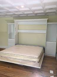 We have found this horizontal murphy beds online, a great solution with a desk in front, that pops out when the bed is in an upright position. King Size Murphy Beds Murphy Bed Nyc Area