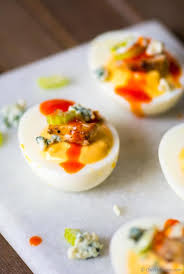 Buffalo Chicken Spicy Deviled Eggs All Flavors Of Buffalo Chicken Wings Moist Chicken Hot Sauce Spicy Deviled Eggs Deviled Eggs Best Deviled Egg Recipe Ever