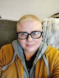 With all the photos of dreads lately, I've gone the other way! I'm 50 and  since I was 45 I've had 6 tattoos, 13 piercings, and shaved my head. My  motto is '