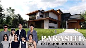 Bong refers to the film as a staircase movie, as we, the audience, spend the first third of the movie learning the basics of the home's architecture. Park Family Exterior House Tour Parasite Movie House Youtube