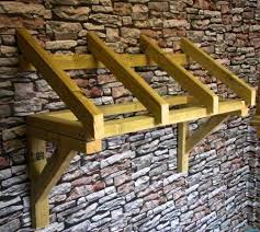 Timber Front Door Canopy Porch Slatted We Use Tanalised Treated Timber This Prevents Rotting Small Porch I Door Canopy Door Canopy Porch Front Door Canopy