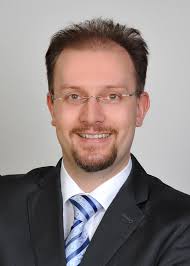 Language Model Guided Knowledge Graph Embeddings