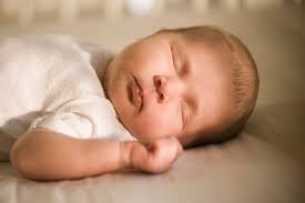 How To Put Baby Into A Crib Without Waking Her Up