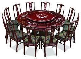 Asian dining room with full height glazing and concrete flooring topped by a bordered area rug. Oriental Dining Room Ideas Round Dining Table Round Dining Table Sets Dining Table Setting