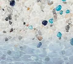 This aggregate pool finish is a mixture of plaster with small pieces of pebbles, abalone shell, and/or glass beads. Interior Finishes Custom Pool Builder Tyler Texas Gunite Pool Construction Above Ground Pool Construction Outdoor Living Pool Renovation Pool Service And Repair