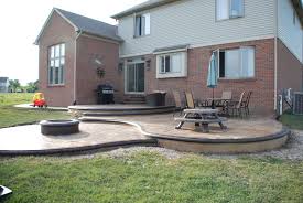 Custom Designed Stamped Concrete Patio W Built In Fire Pit Concrete Patio Makeover Concrete Patio Designs Poured Concrete Patio