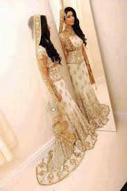 Bride In White And Golden Pakistani Bridal Dresses Indian Dresses Bridal Dresses