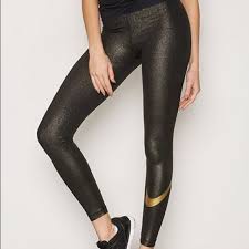 80% nylon, 12% metallic, 8% elastane. Nike Pants Jumpsuits Nike Nwt Gold Shimmer Leggings Size Small Poshmark