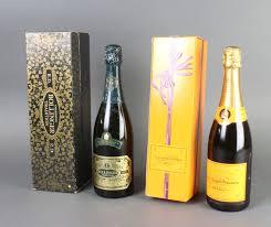 A bottle of Bollinger Tradition RD 1973 ...