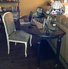 Putting A Drop Leaf Table Behind A Couch Does Triple Duty As A Desk Sofa Table And Dining Living Room Remodel Window Treatments Living Room Table Behind Couch