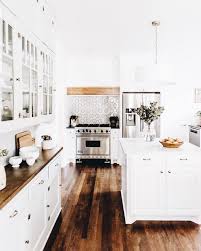 Mix And Match White And Wood For A Warm Inviting Kitchen Home Decor Home Home Kitchens
