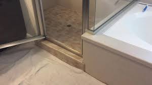 Custom building products has a primer specifically for this purpose.but i was going to set the shower pan area with epoxy. Tile Over Tile Shower Floor With Sga Super Grout Additive Youtube