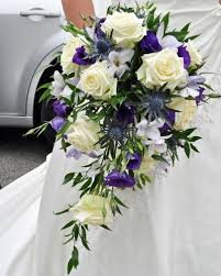 A broad selection of bridal bouquets and arrangements; Wedding Bouquet Red Yellow White Purple Wedding Flowers Flower Bouquet Wedding Red Bouquet Wedding