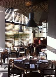 restaurant silo s boortmeerbeek with vincent v g armchairs in massive walnut by billiani billiani tafel restaurant